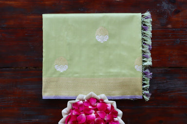 Pista Green handloom Banarsi saree with kadhua motifs in pure silk