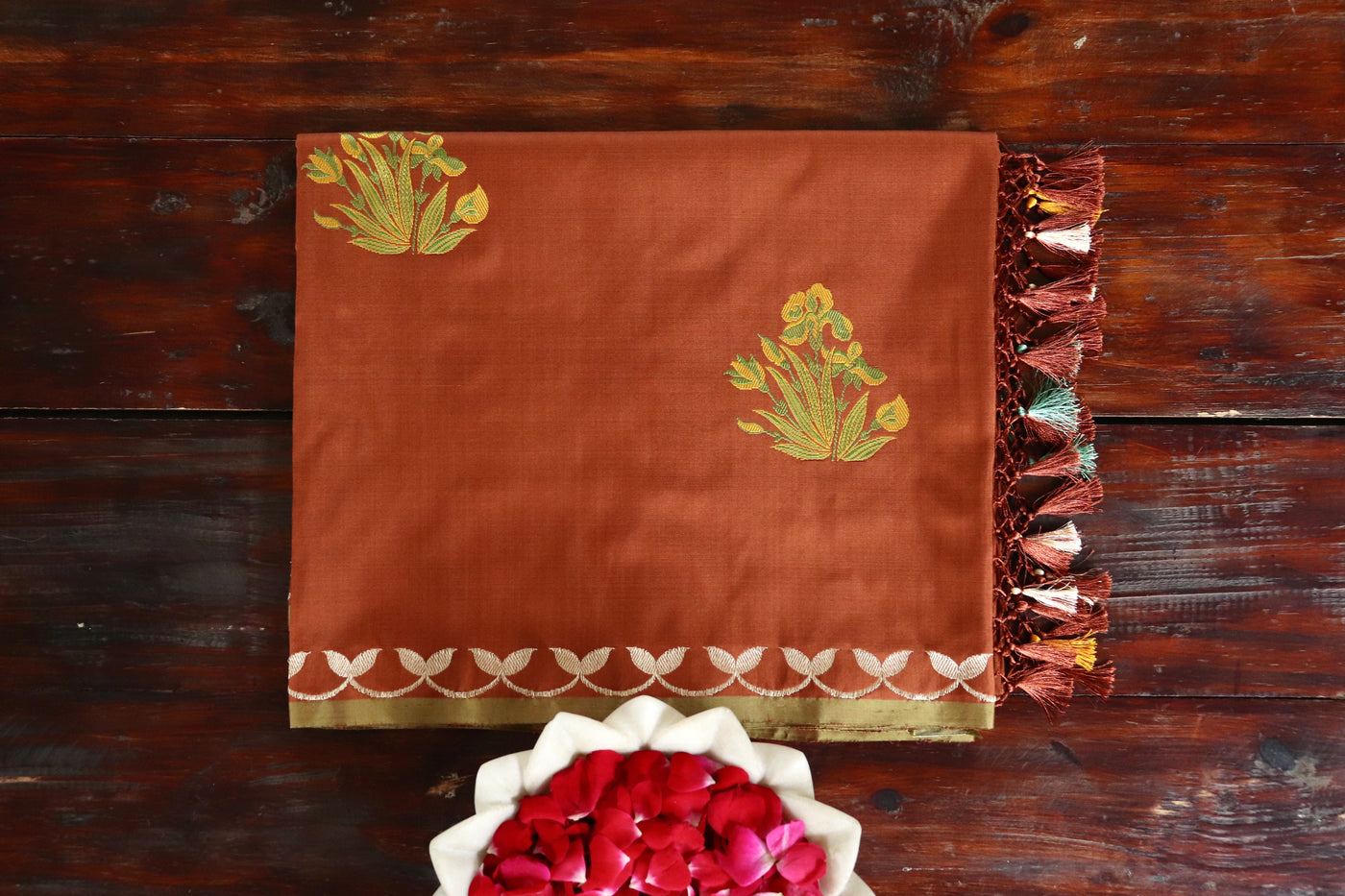 Rust handloom Banarsi saree with kadhua motifs in silk