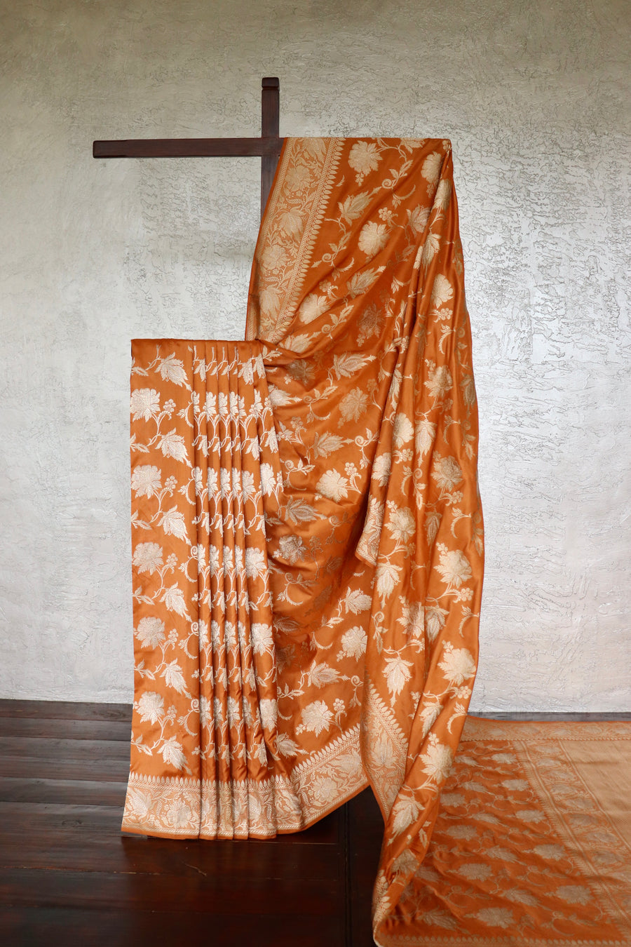 Rust handloom Banarsi saree with jangla motifs in pure silk