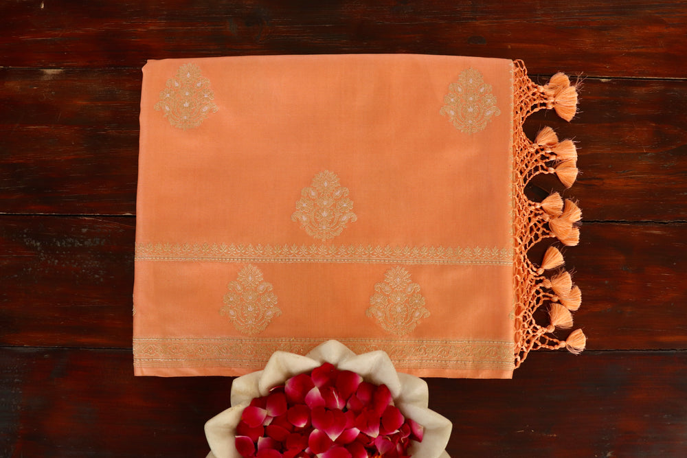 Peach handloom Banarsi saree with kadhua motifs in pure silk