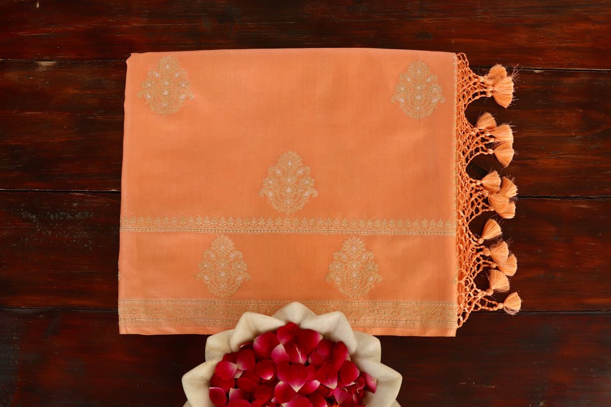Peach handloom Banarsi saree with kadhua motifs in pure silk