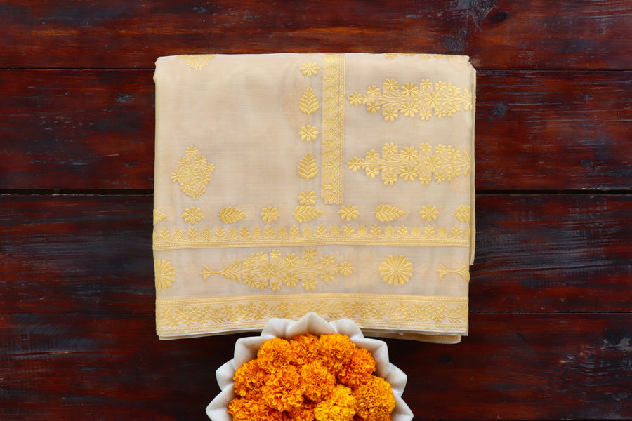 Yellow handloom Banarsi saree with kadhua motifs in pure Kora silk