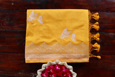 Yellow handloom Banarsi saree with buti motifs in pure Katan silk