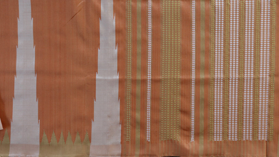 Mulberry silk texture of Peach Ikat saree