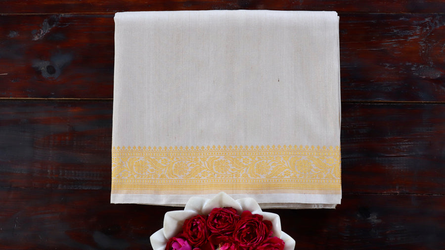 Ivory Kuniya pure silk handloom Banarasi saree draped for the camera