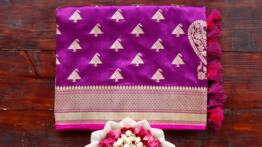 Rich Purple pure Katan silk Banarasi saree with thread-by-thread motifs, draped for the camera.